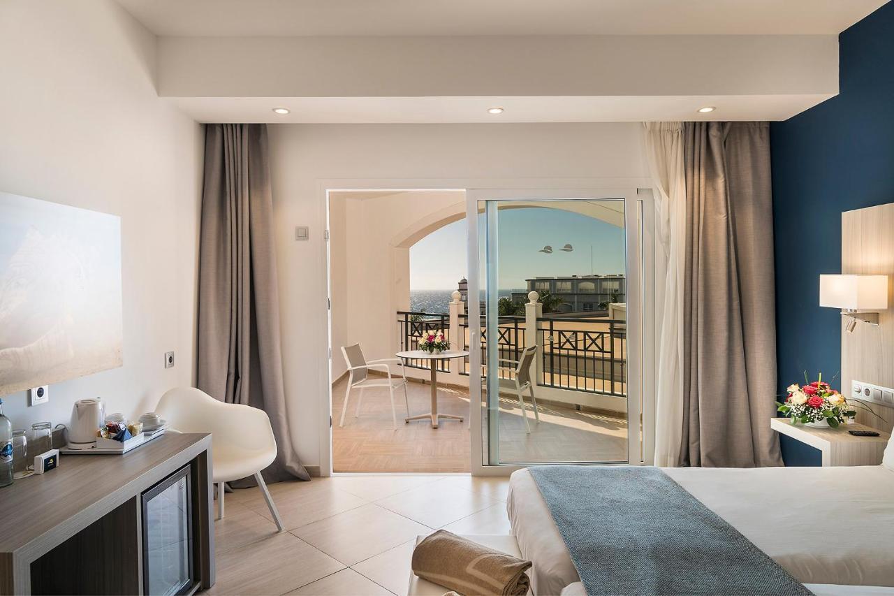 Double or Twin Room with Side Sea View,767268907:JPEG